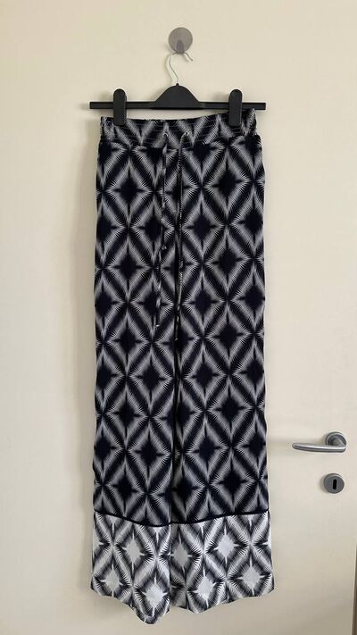 Black and white geometric wide leg trousers